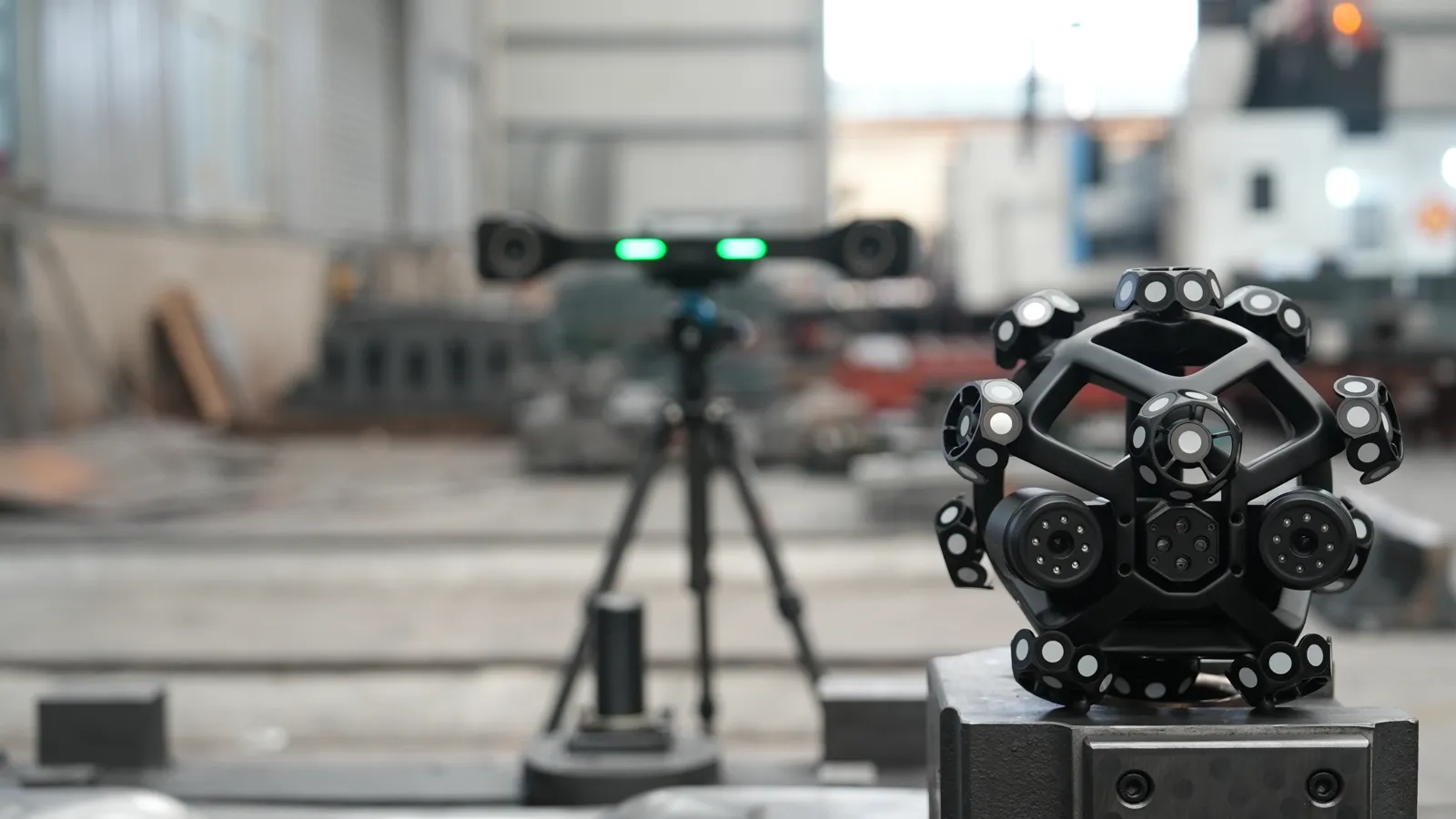 V-Track optical tracker on a tripod in a factory