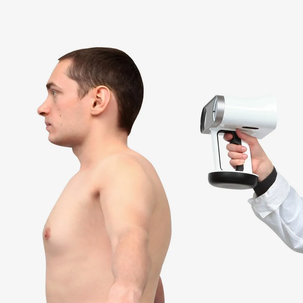 An Artec Leo scanning a man’s head and shoulders