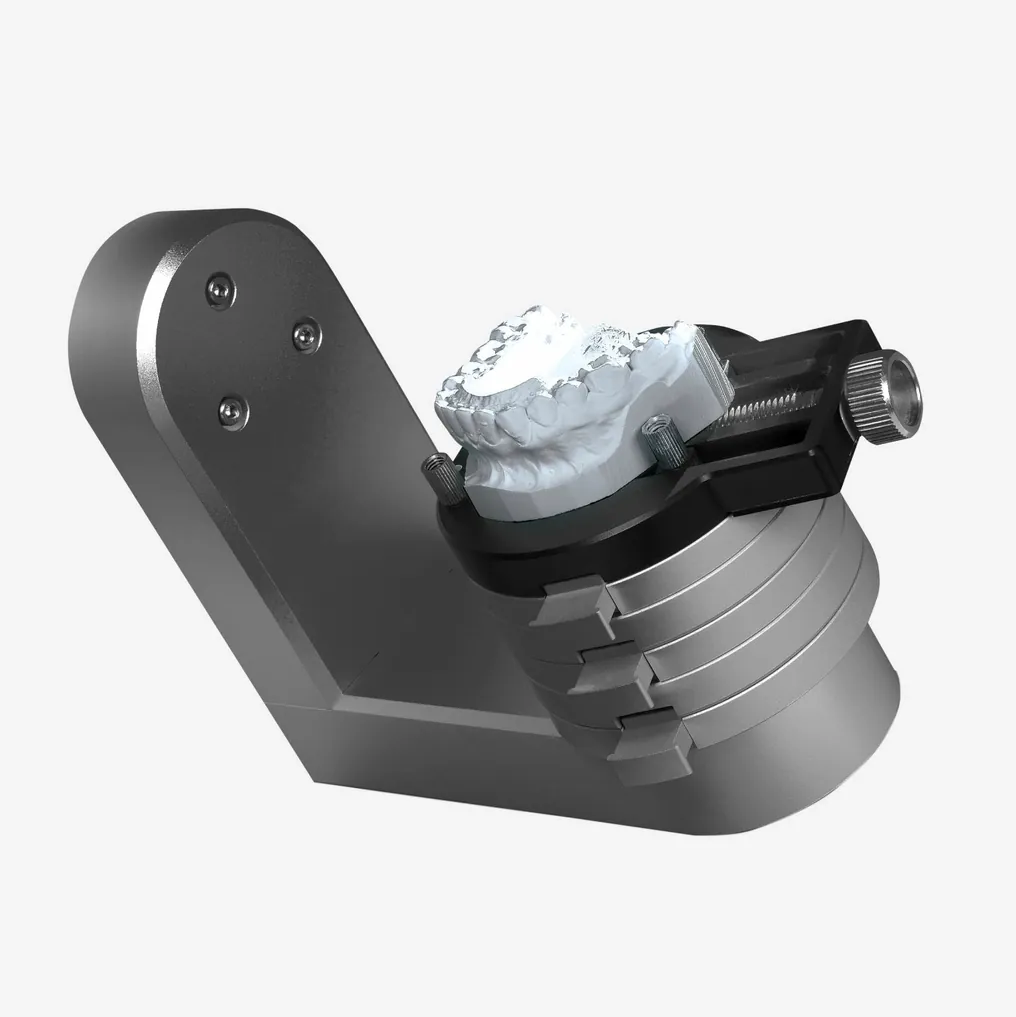 A dental cast on the scanning platform of an Artec Micro II
