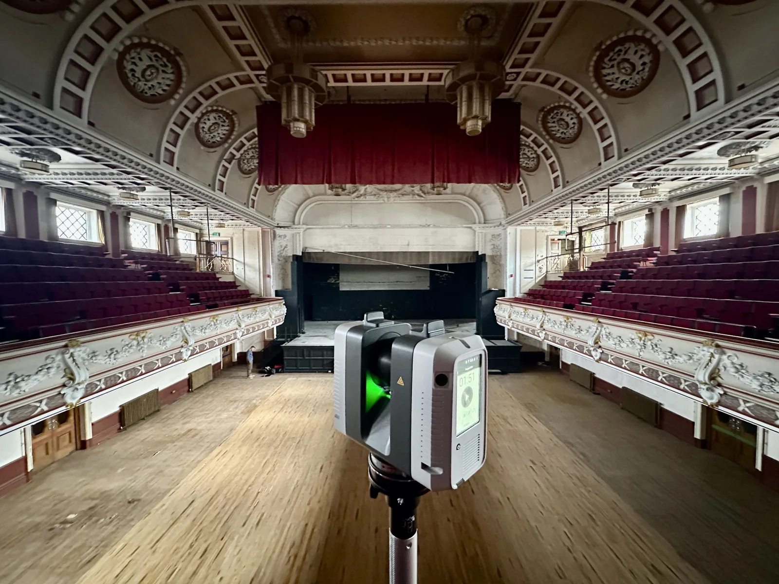 Artec Ray II on the auditorium floor, facing the stage